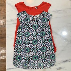 Two short sleeve red & blue patterned shirts